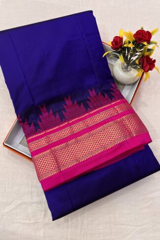 Elegant royal blue and pink silk saree with golden zari work – perfect for weddings and festive occasions.