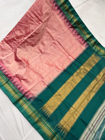 Ilkal saree in blush pink and emerald green with traditional gold zari pallu and intricate chikki paras border, laid out in full view