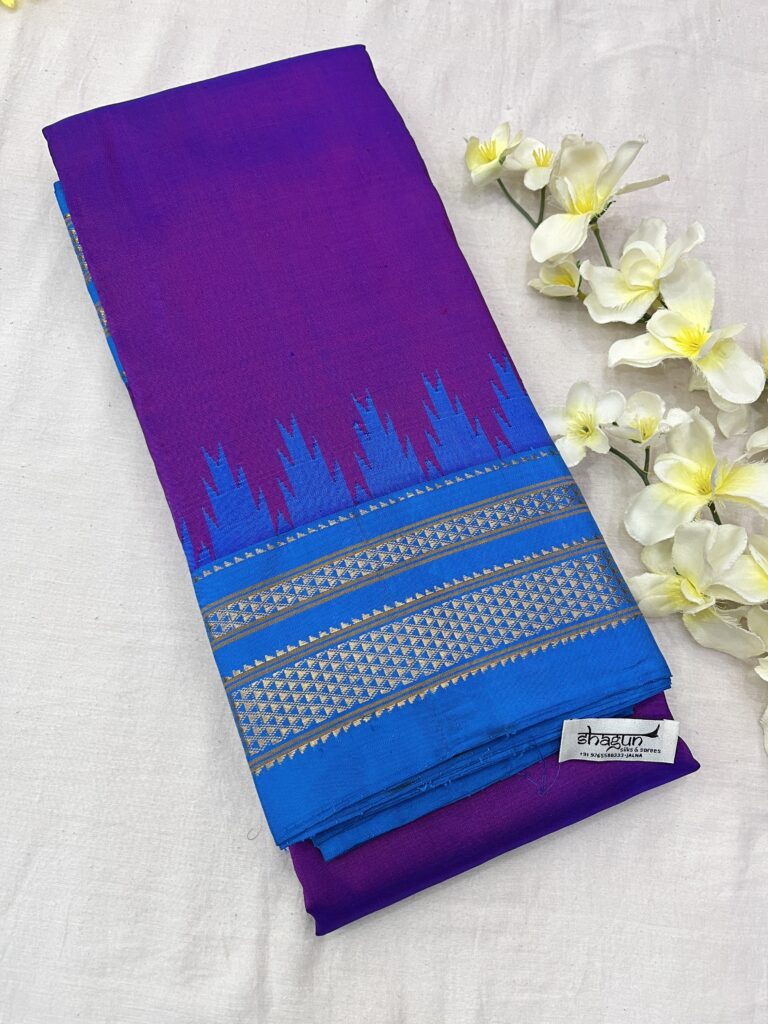 Handwoven Pure Silk Ilkal Saree in magenta and royal blue with intricate golden zari border.