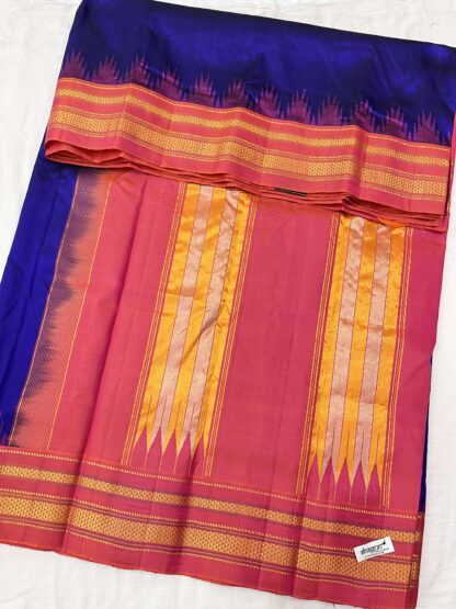 Handwoven Ilkal Pure Silk Saree fully opened, showcasing its traditional Tope Tenni pallu, vibrant magenta and golden border, and rich royal blue body.